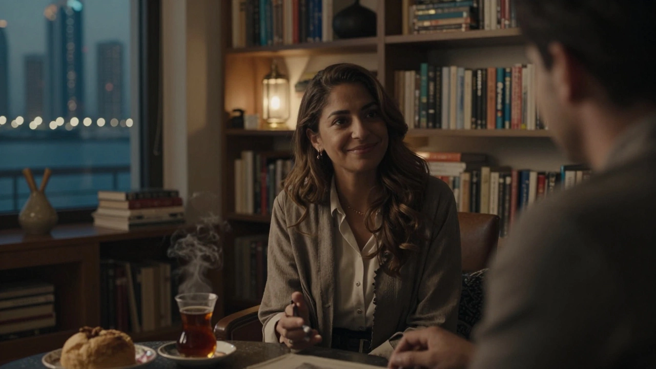 A woman listening attentively to a client in a cozy Dubai apartment filled with books and soft lamplight.